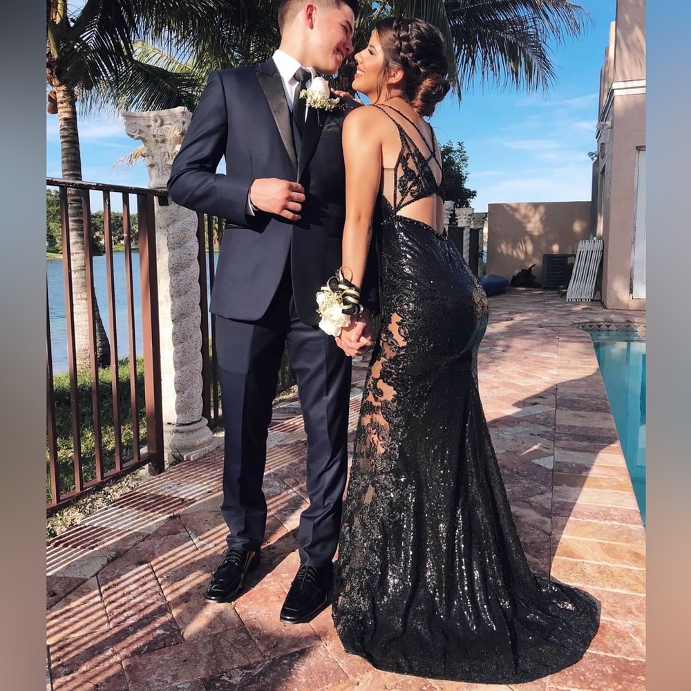 Black sequins floor length gown. Size 2, Originally $550.